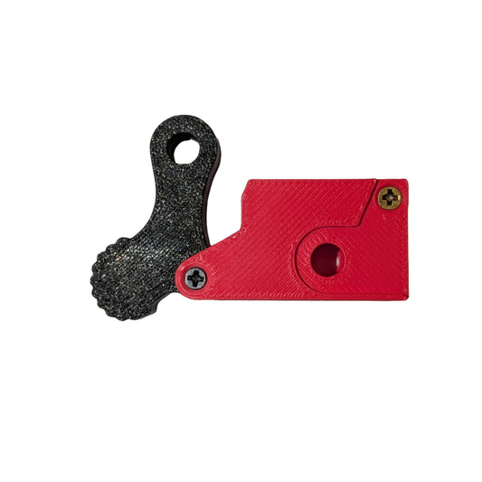 Red and black mechanical component on a beige background